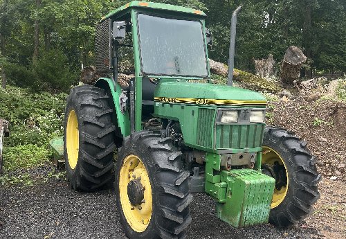 John Deere 5400 tractor with flail axe attachment