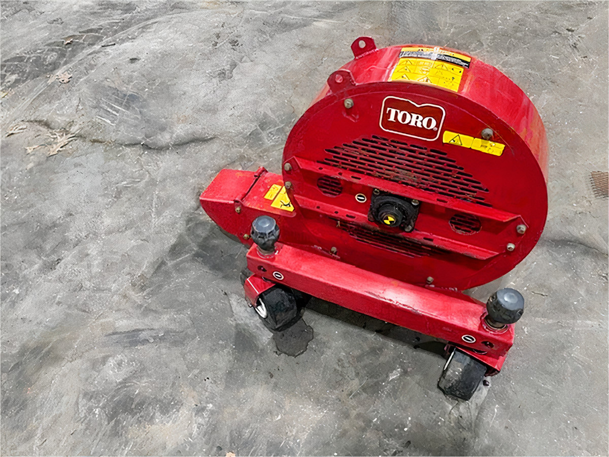 Toro Groundsmaster front-mount blower attachment