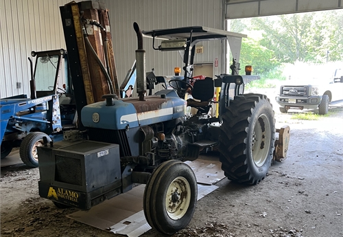 New Holland Tractor with Mower Attachments