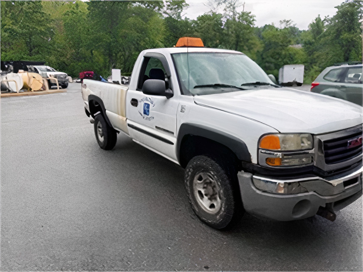 2005 White GMC 2500HD 4x4 Pickup Truck with Plow