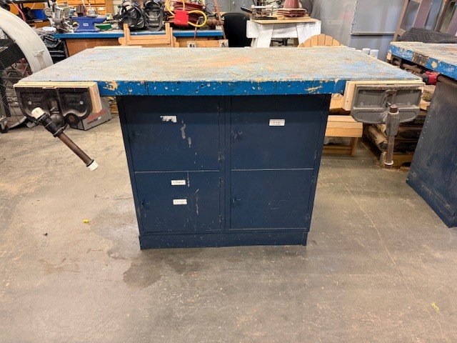 Heavy duty work bench with 4 cabinet storage and wood vices