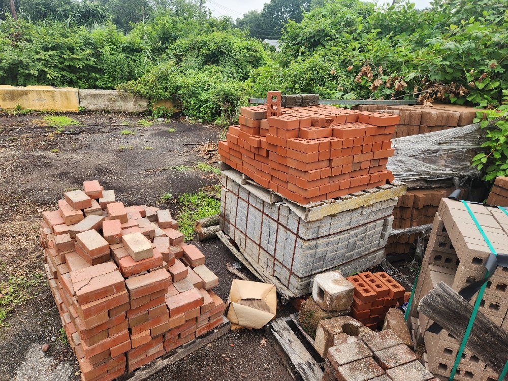 Several pallets of miscellaneous bricks and pavers