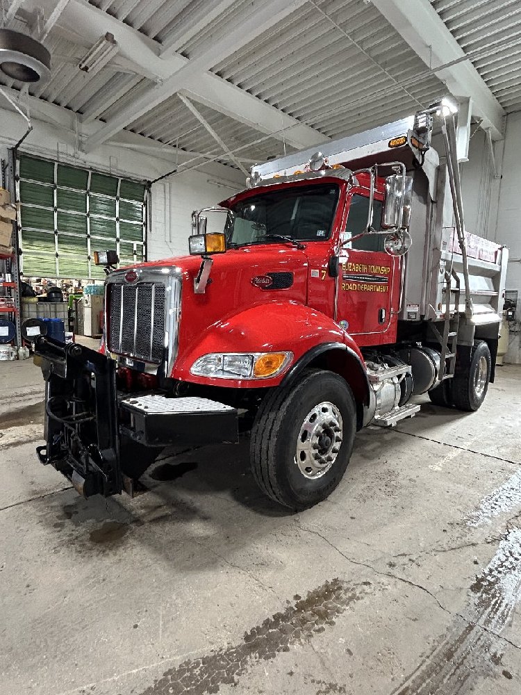 2016 Peterbilt 348 municipal dump truck.