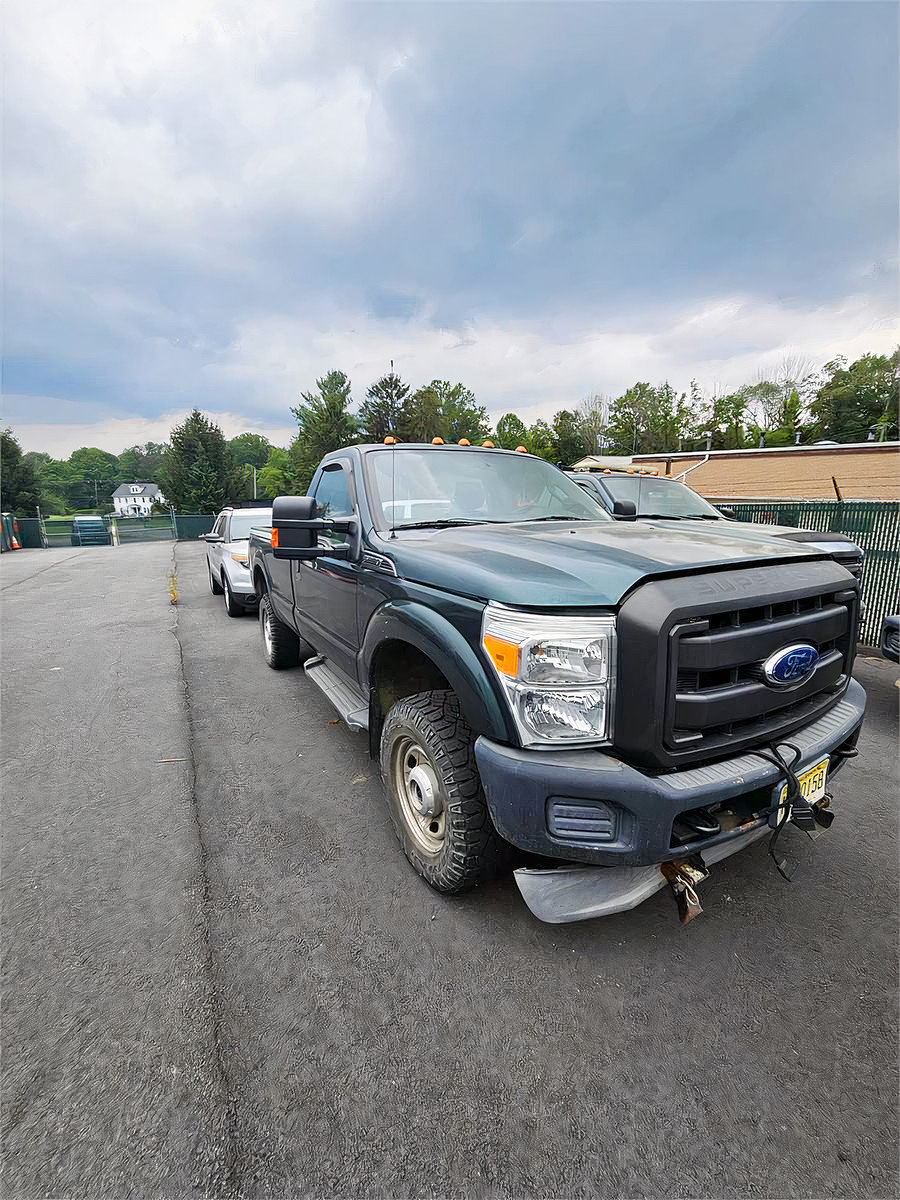 2012 Ford F350 6.2L gas 4WD pickup 9ft Western plow 90,293 miles